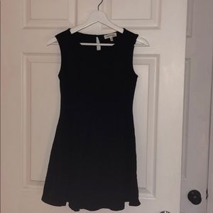 Stretchy little black cocktail dress.